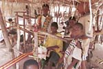Children weaving at Tafe Abuipe, Volta Region, Ghana